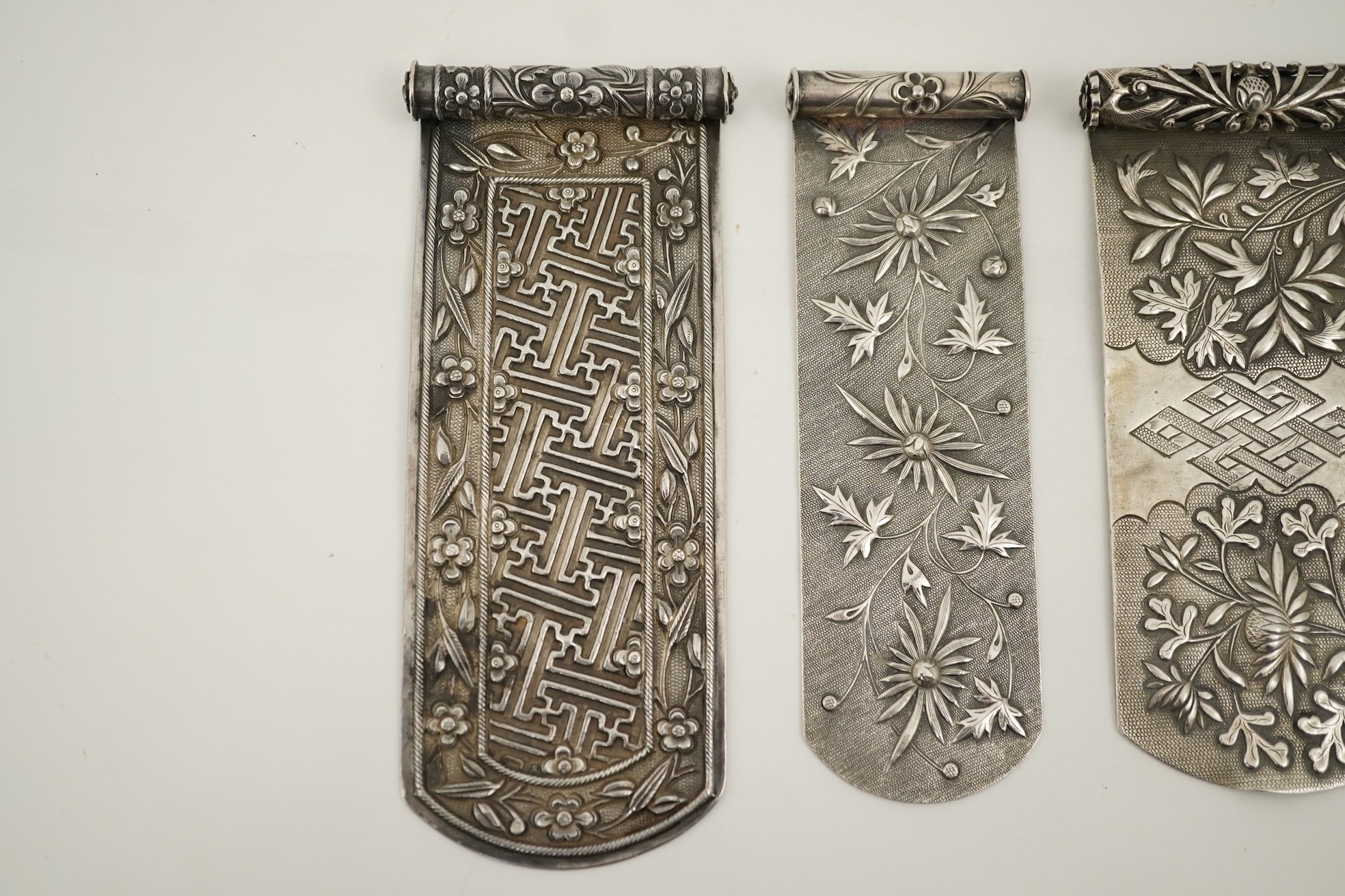 Four Chinese silver hair ornaments, bian fang, late 19th century
